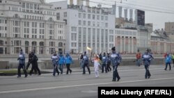 Олимпийский факел на улицах Москвы