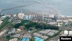 Вид на АЭС «Фукусима», на которую обрушилось цунами. Августа 2013 года.