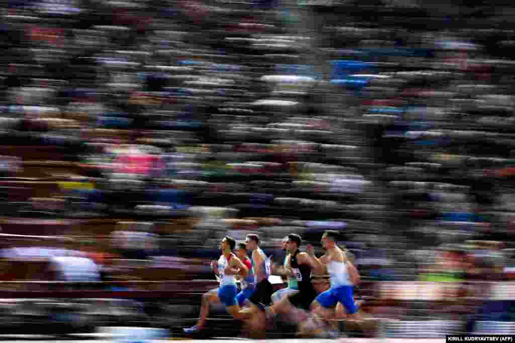 Russian athletes attend the 60-meter sprint event in the Russian Winter athletics competition in Moscow on February 9. (AFP/Kirill Kudryavstev)