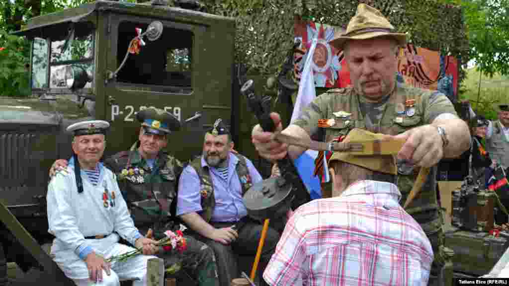 People in Chisinau, Moldova, wear wartime uniforms.