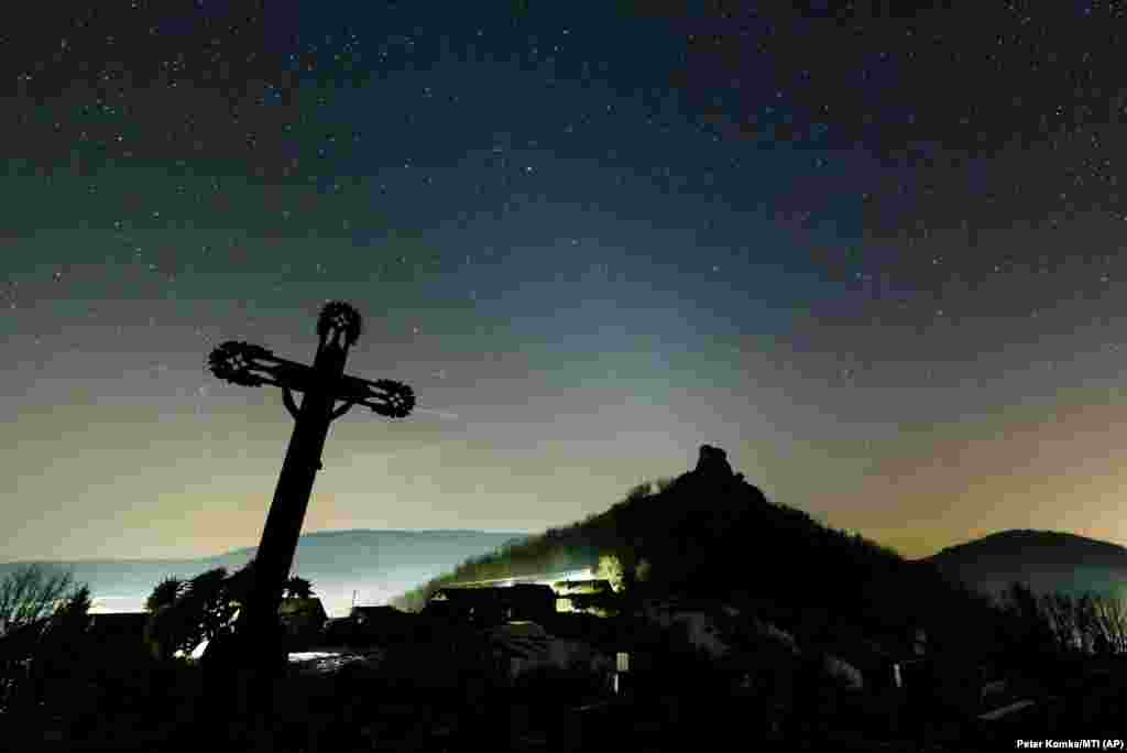 The night sky as photographed near Hajnacka, southern Slovakia. The faint zodiacal light is caused by interplanetary dust reflecting sunlight. (AP/Peter Komka/MTI)