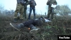 The Russian report suggested the body was a civilian victim killed at the hands of Ukrainian forces to intimidate pro-Russian separatists in the Donetsk region.