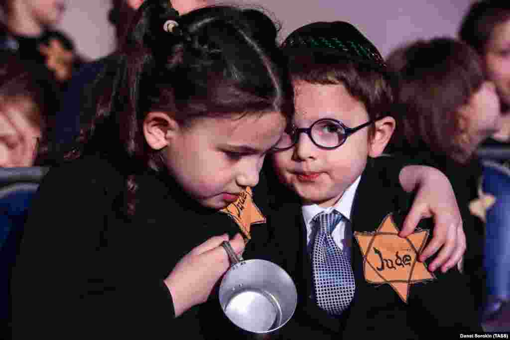 Children take part in a memorial ceremony for Holocaust victims at a Jewish community center in Yekaterinburg, Russia. (TASS/Donat Sorokin)