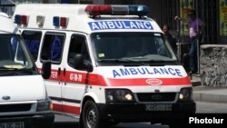 Armenia -- Ambulance vehicles parked on Khorenatsi Street leading to a police station in Yerevan seized by gunmen, 27July, 2016.