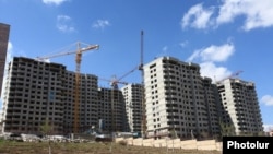 Armenia - New apartment blocks are constructed in Yerevan, 4Apr2015.