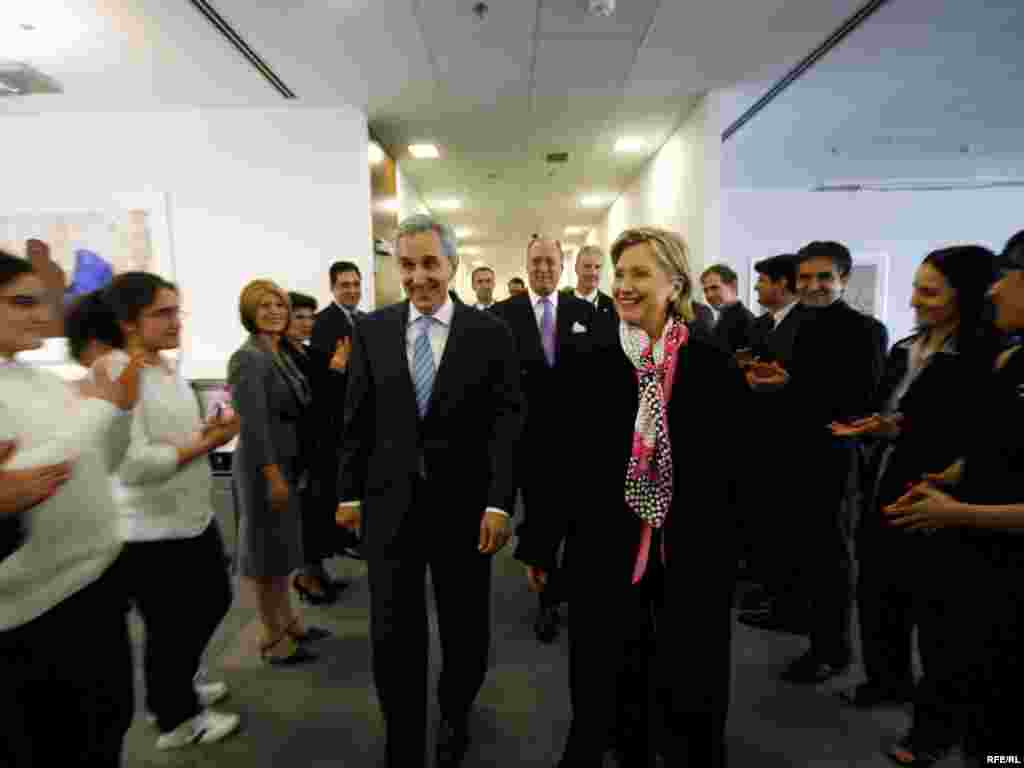 Secretary Clinton is greeted by the staff of Radio Free Afghanistan.