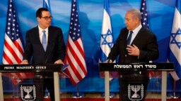 استیو منوچین (چپ) در نشست خبری مشترک روز دوشنبه با بنیامین نتانیاهو در اورشلیم.