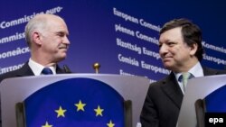 Грек өкмөтүнүн премьер-министри Георгиос Папандреу жана Еврокомиссиянын төрагасы Жозе Мануэл Баррозу. 