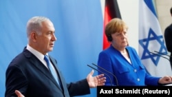 Ангела Меркел менен Биньямин Нетаньяху. 