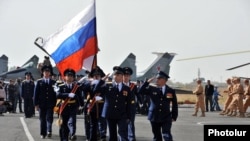 Armenia - Russian Air Force officers march at an airfield in Yerevan, 18Oct2013.