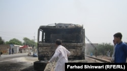 The aftermath of an attack on NATO supply tankers in Khyber Pass on August 21, 2014.