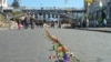 Улица Институтская в Киеве: цветы и свечи в честь погибших 