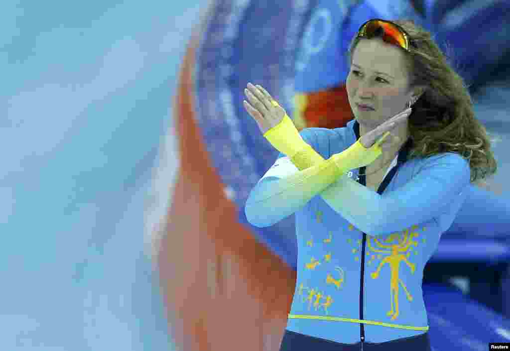 Kazakhstan&#39;s Yekaterina Aydova gestures after competing in the women&#39;s 1,500-meter speed-skating race at the Adler Arena. (Reuters/Issei Kato)