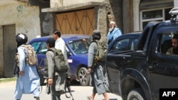 Armed Taliban fighters patrolling the streets in Buner district last week