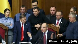 UKRAINE -- Ukrainian lawmakers listen to parliament speaker Andriy Parubiy, center, during a parliament session in Kyiv, November 26, 2018
