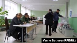 The Central Election Commission said that nearly 400,000 of the country's 2.8 million registered voters had cast ballots by late morning local time.