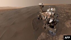 Марста жүретін Curiosity аппараты.