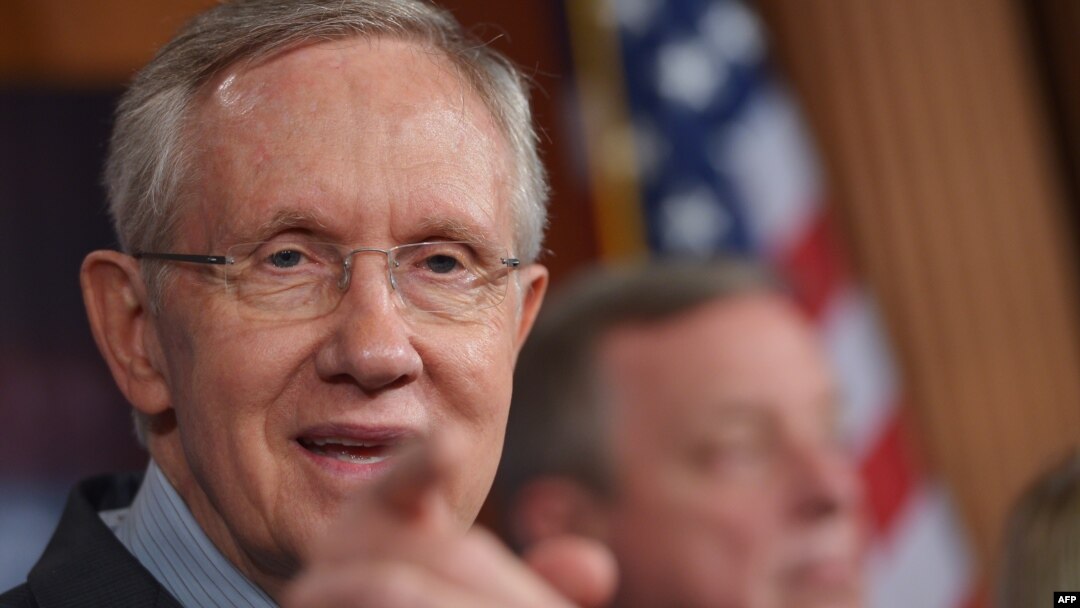 U.S. Senate Majority Leader Harry Reid (in file photo) said the agreement would fund the U.S. government through January 15 and avert a debt default through February 7.