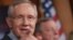 U.S. Senate Majority Leader Harry Reid (in file photo) said the agreement would fund the U.S. government through January 15 and avert a debt default through February 7.
