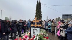 Navalny Supporters Lay Flowers At Moscow Grave One Year After Death
