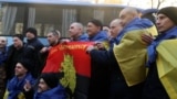 Grab, Ukrainian prisoners return home