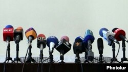 Armenia - TV and radio microphones set for a news conference in Yerevan.