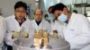 An International Atomic Energy Agency team checks the enrichment process inside the uranium enrichment plant at Natanz in January 2014.