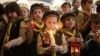 Ukrainian 'Plast' Scouts carry the Bethlehem flame of peace at the railway station in Kyiv on December 15.