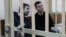 Zenit St. Petersburg soccer player Aleksandr Kokorin (left) and fellow defendant Aleksandr Protasovitsky attend a hearing in a court in Moscow on April 10. 