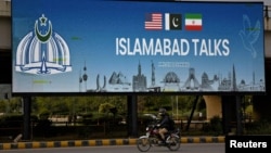 A billboard installed alongside a road as Pakistan prepared to host the US and Iran for peace talks in Islamabad last month.