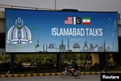 A billboard installed alongside a road as Pakistan prepared to host the US and Iran for peace talks in Islamabad last month.