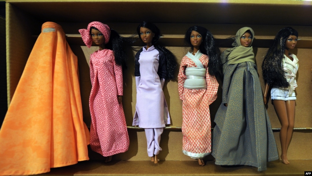 It seems these Barbie dolls wearing cultural clothes from around the world would not be welcome in Tajikistan, which is seeking to promote the country's traditional dress. (file photo)