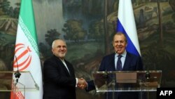 Russian Foreign Minister Sergei Lavrov and his Iranian counterpart Javad Zarif hold a press conference following their talks in Moscow on September 24, 2020