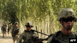 U.S. troops patrol during a mission in Logar Province, Afghanistan on August 14.