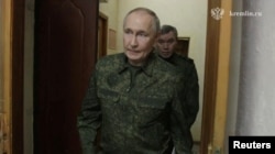 Russian President President Vladimir Putin visits Moscow's armed forces' command center in the Kursk region on March 12.