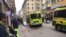 Emergency services help the injured near the scene where a truck crashed into a department store in central Stockholm in April. An Uzbek man has been charged with deliberately ramming the shop, killing four people. 