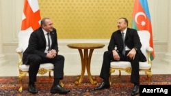 Presidents Giorgi Margvelashvili of Georgia (left) and Ilham Aliyev of Azerbaijan have a one-on-one meeting in Baku on February 12.