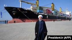 FILE: Iranian President Hassan Rohani posing in Chabahar port.