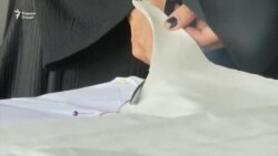 Оё созише байни либоси исломиву миллӣ имконпазир аст?