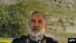 A TV grab shows Islamic Revolutionary Guards Corps ground-forces commander General Nur Ali Shushtari addressing a meeting shortly before he was killed in the October 18 attack.