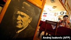 A portrait of Josip Broz Tito, Yugoslavia's former communist leader, is displayed inside a Belgrade nostalgia-themed restaurant.