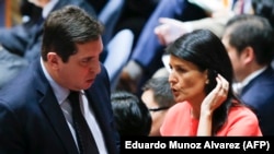 U.S. Ambassador to the United Nations Nikki Haley (right) speaks with Vladimir Safronkov, Russian Deputy UN Ambassador