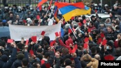 Armenia -- Opposition supporters demonstrate outside the parliament building in Yerevan, December 9, 2020.