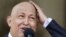 Venezuelan President Hugo Chavez joked about his lack of hair during cancer treatment while talking to reporters at Miraflores Palace in Caracas in 2011.