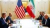 Former U.S. Secretary of State John Kerry (L) and Iran's Foreign Minister Mohammad Javad Zarif attend a bilateral meeting in Vienna, Austria, May 17, 2016.