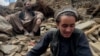 Hamidullah (right) and his neighbors in the district of Chawkai pulled the bodies of his parents, five sisters, and two brothers from the rubble of Afghanistan's deadly earthquake.