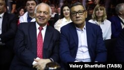 Gafur Rakhimov (right), interim president of the International Boxing Association (AIBA), attends a boxing event in Sochi, Russia, on February 3 with former AIBA President Franco Falcinelli.