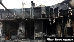 A burnt-out building, apparently a bus station in Sanandaj, Western Iran. November 18, 2019