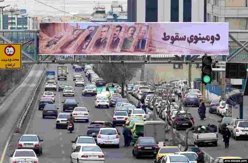 A propaganda banner showing historical leaders and US President Donald Trump. The Persian text says "dominoes fall."