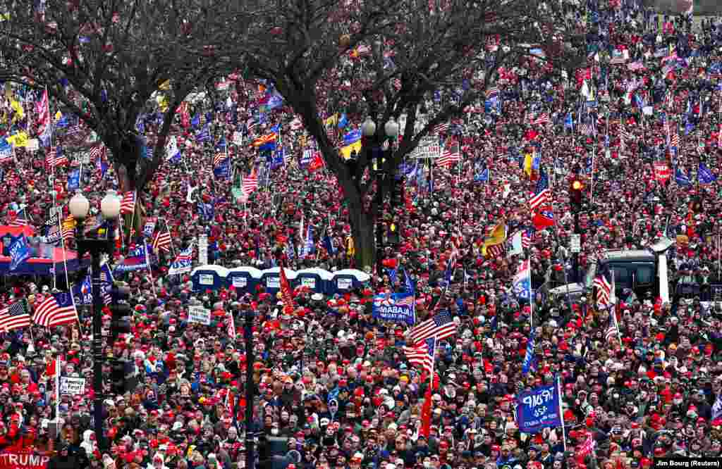 Supporters of U.S. President Donald Trump gather near the Washington Monument by the White House ahead of his rally and speech to contest the certification by the U.S. Congress of the results of the 2020 U.S. presidential election in Washington, U.S, Janu